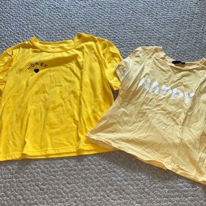 2 yellow graphic tees